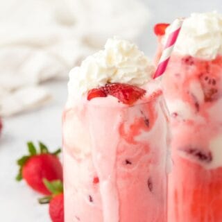 Glasses of strawberry floats on the table ready to enjoy.