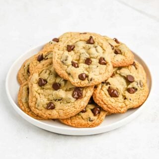 A plate of Mrs Fields chocolate chip cookies ready to eat.