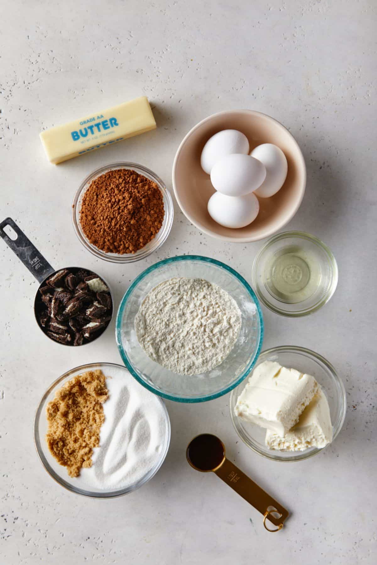 Ingredients to make oreo bars on the counter before mixing together.
