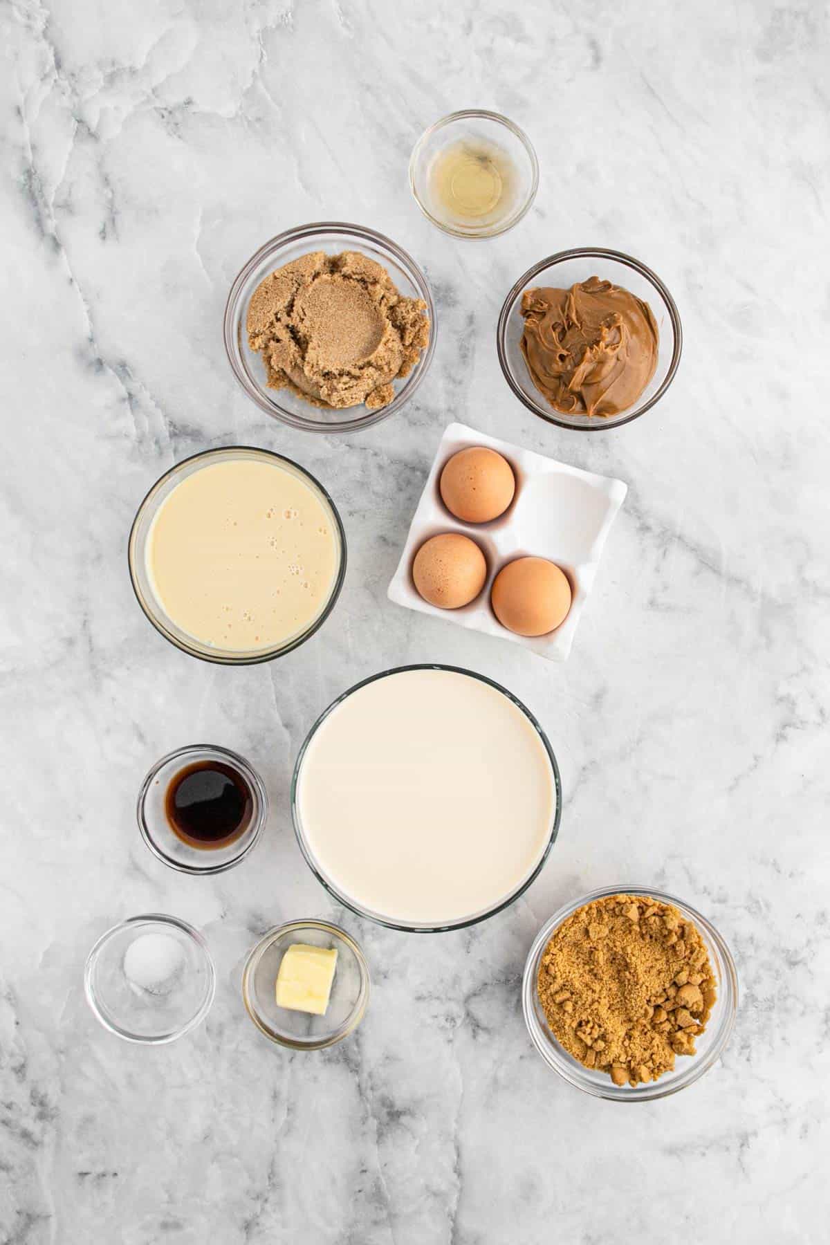 Ingredients to make cookie butter ice cream on the table.