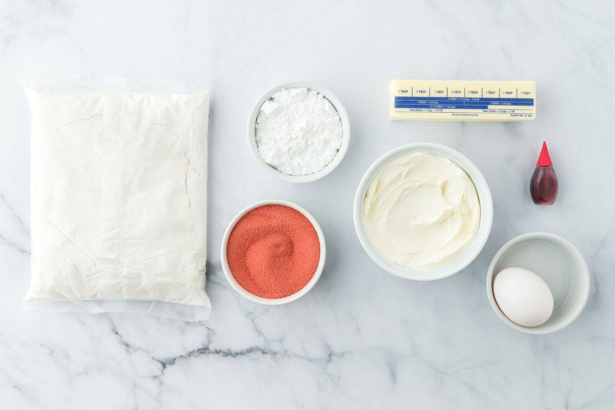 Ingredients to make raspberry cookies on the table.