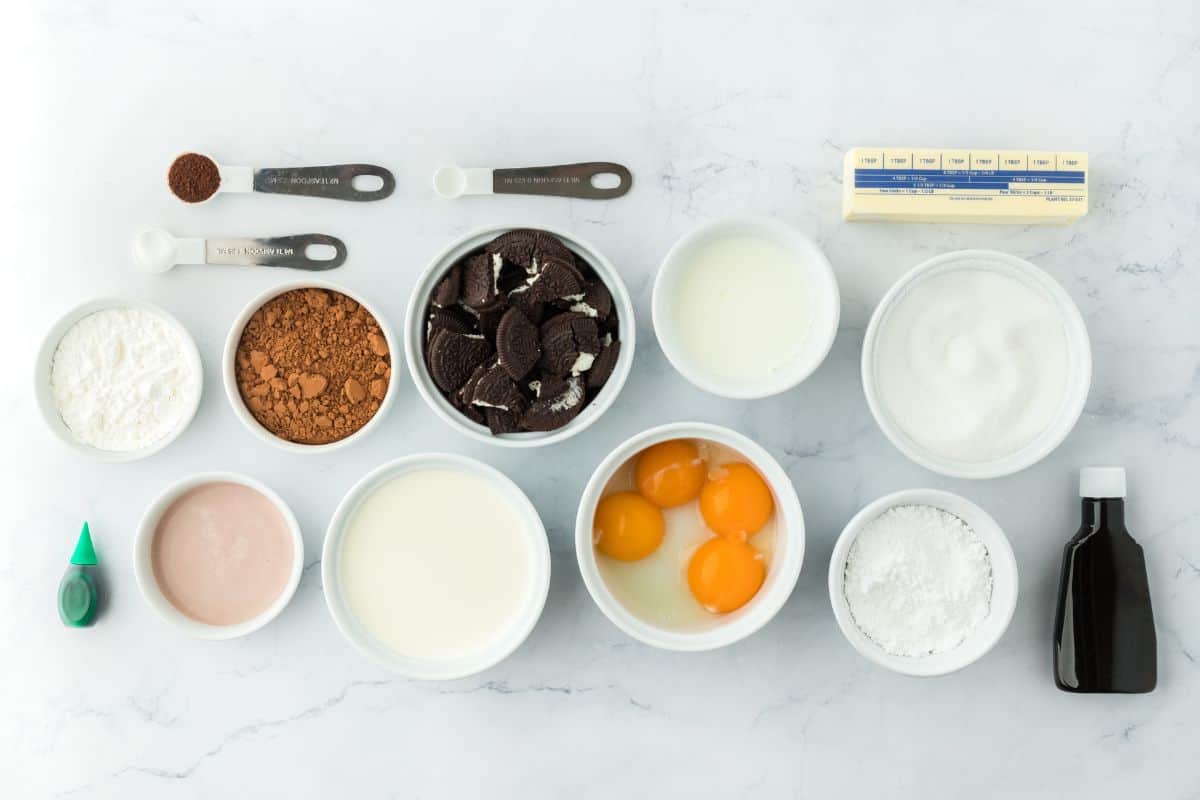 Ingredients to make mint chocolate cream pie on the table before mixing together.