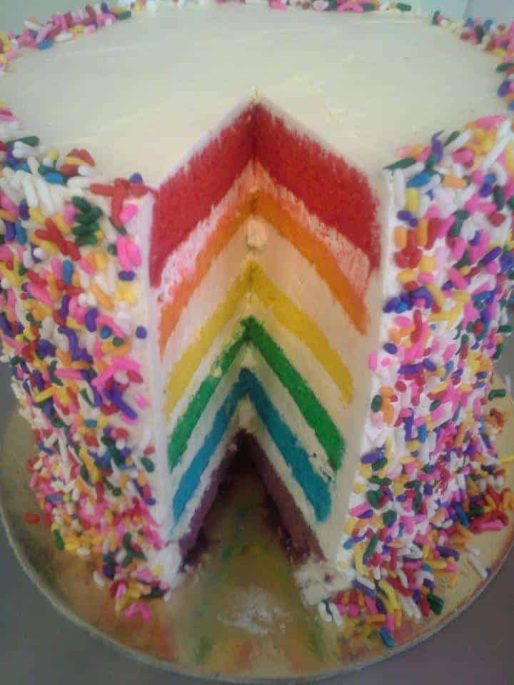 Bake Chicago's rainbow cake with a piece cut out 
