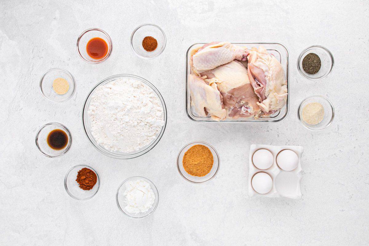 Ingredients to make big mama's fried chicken on the table before mixing together.