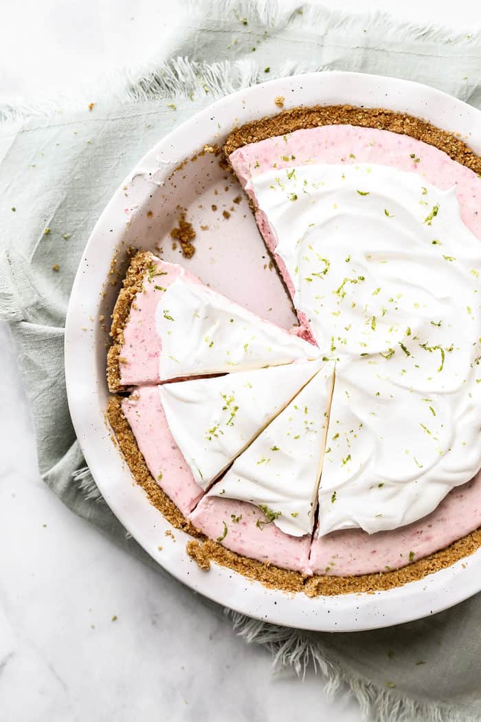 Overhead of Frozen Strawberry Pie sliced with one slice missing