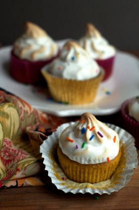 Sweet Potato Cupcakes with one in the foreground with the wrapper removed