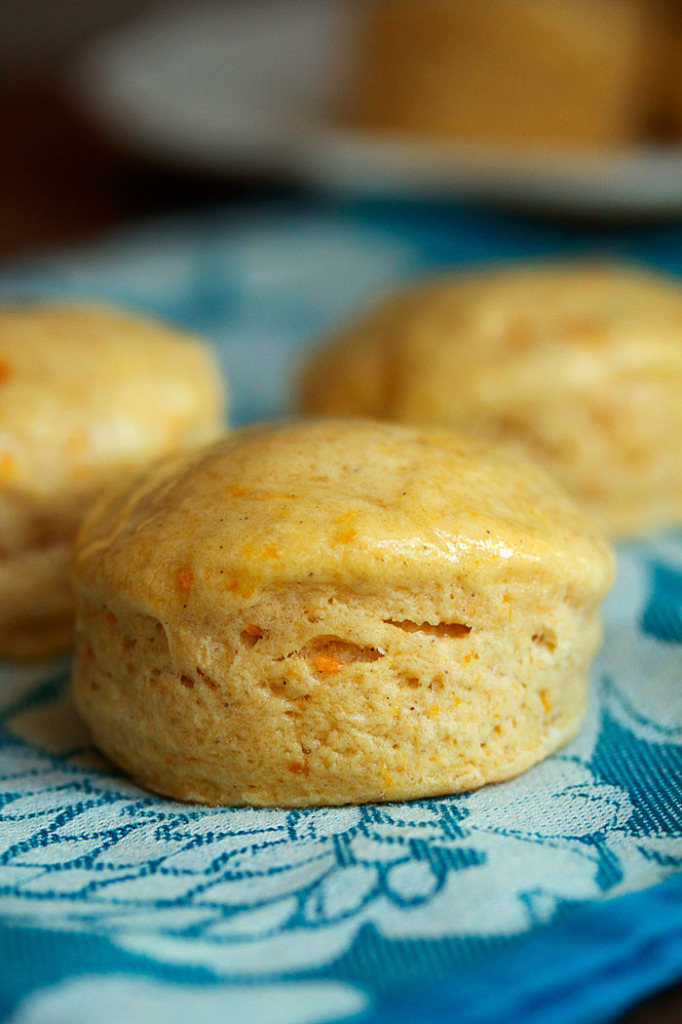 A close up of flaky spiced sweet potato biscuits ready to serve