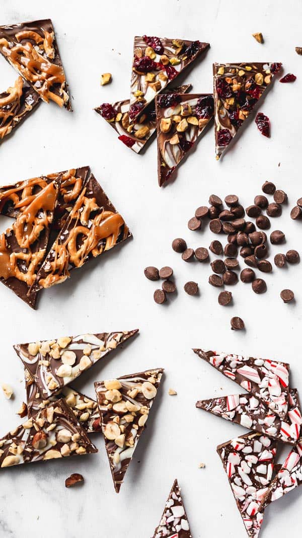 An overhead of chocolate bark scattered with chocolate chips