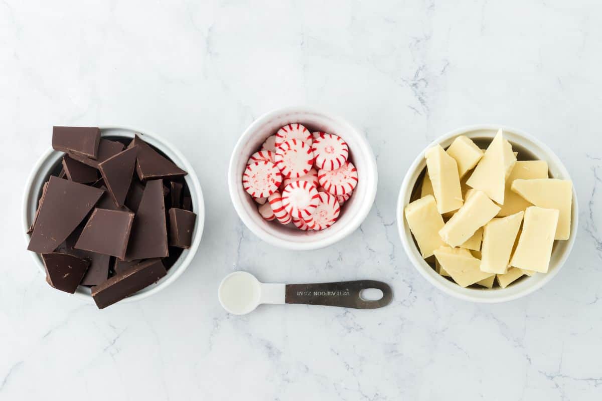 Ingredients to make peppermint bark on the table before making the recipe.