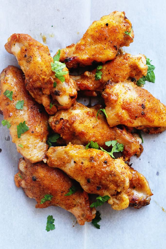 An overhead shot of jerk chicken wings baked to perfection with wonderful spice