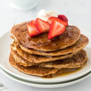 French Toast Pancakes on a white plate on white background