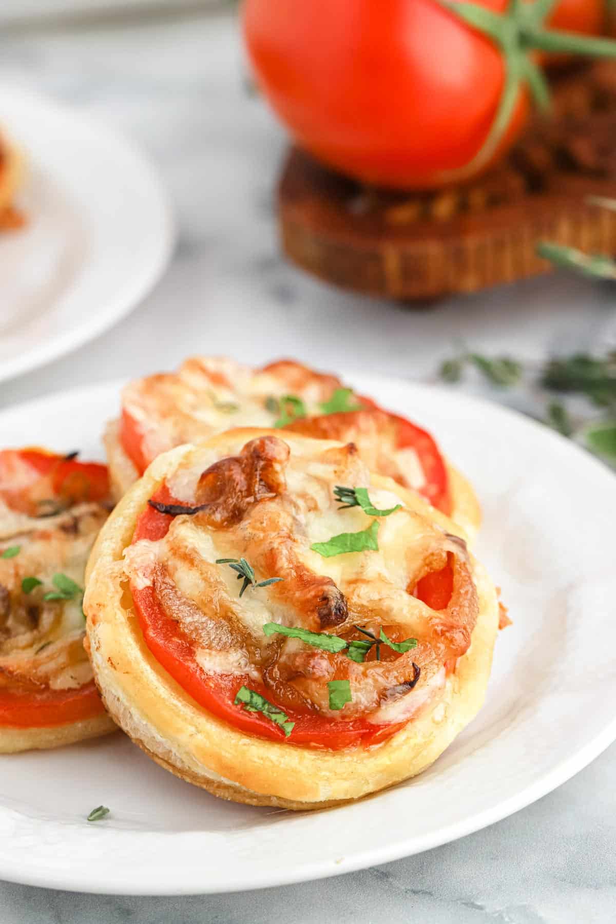 Oscar Tomato Tarts piled on a white plate