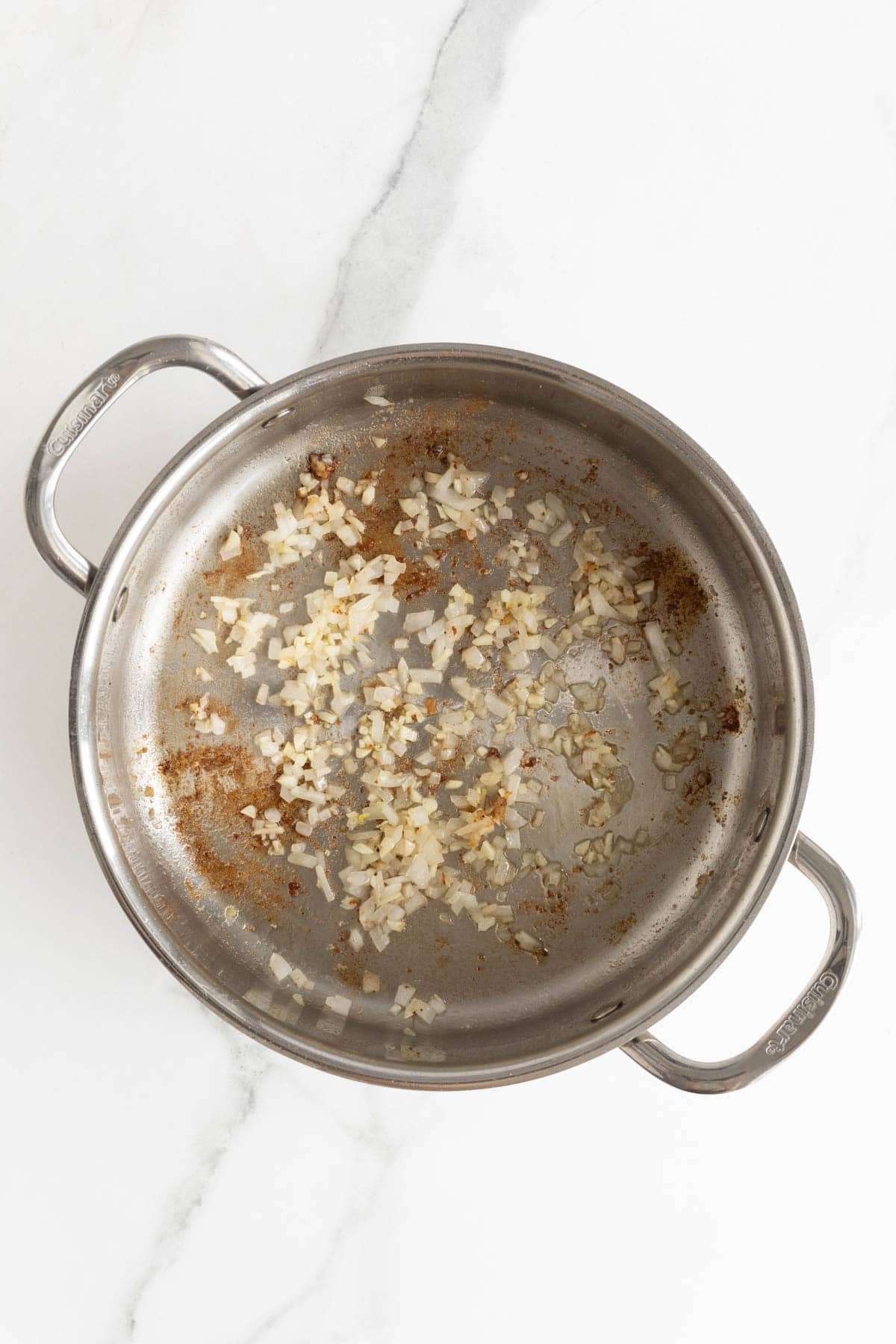 Shallots and garlic in skillet cooking