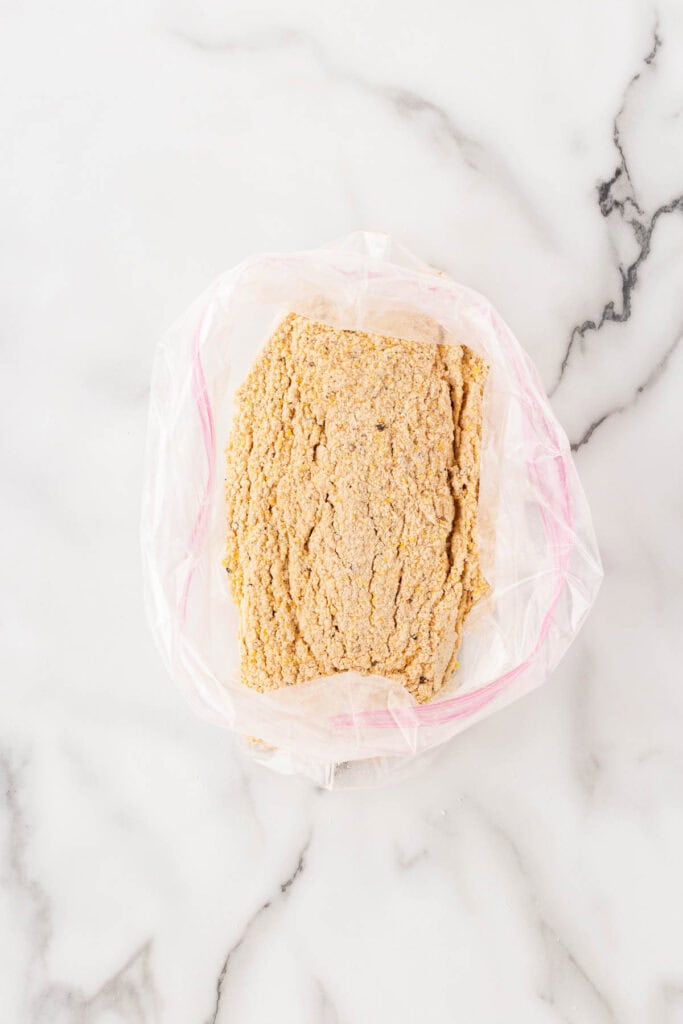 Mixed cornmeal and spices in a ziptop bag