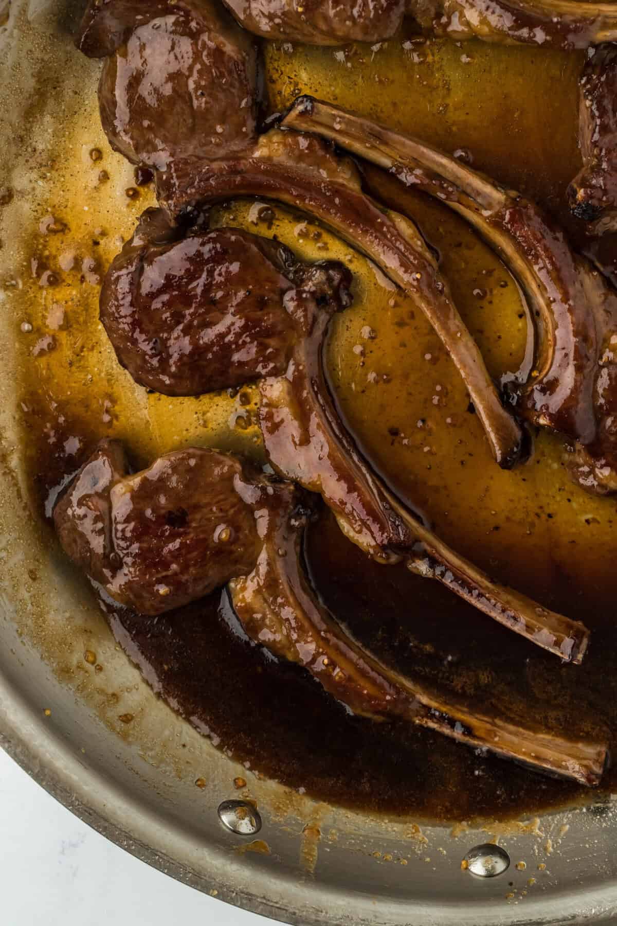 Lamb chop recipe in a skillet after cooking