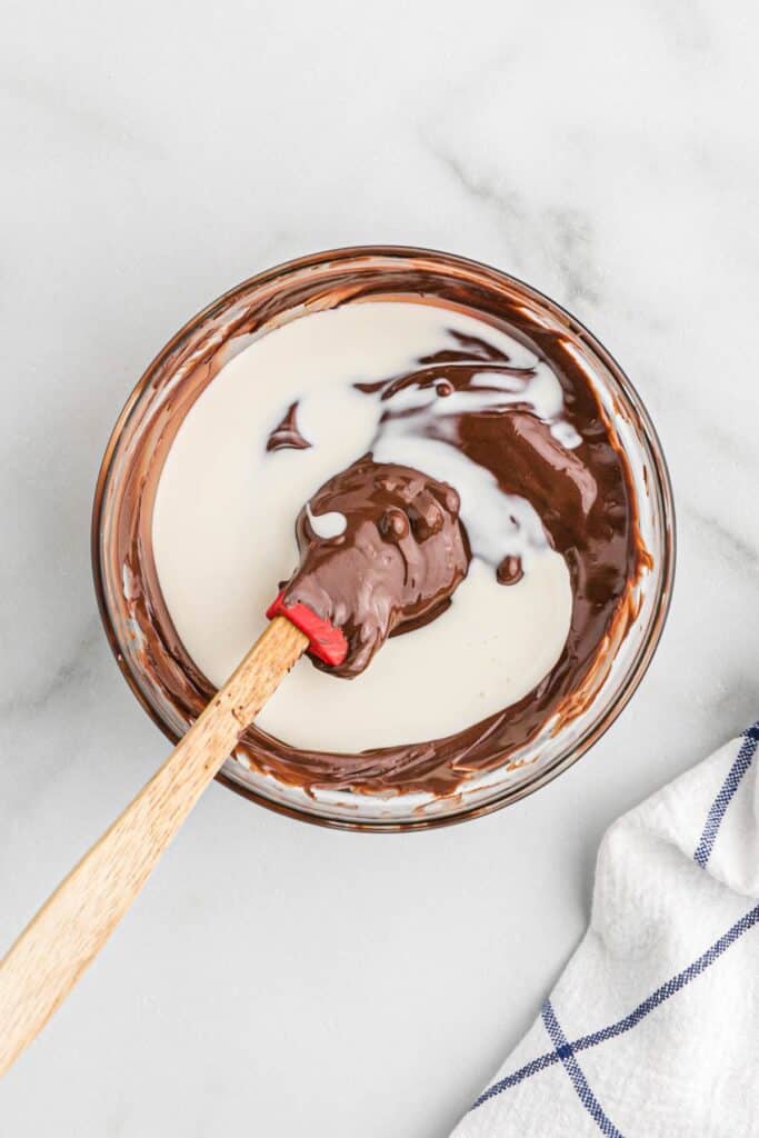 Making the ganache to top a frozen peanut butter pie.