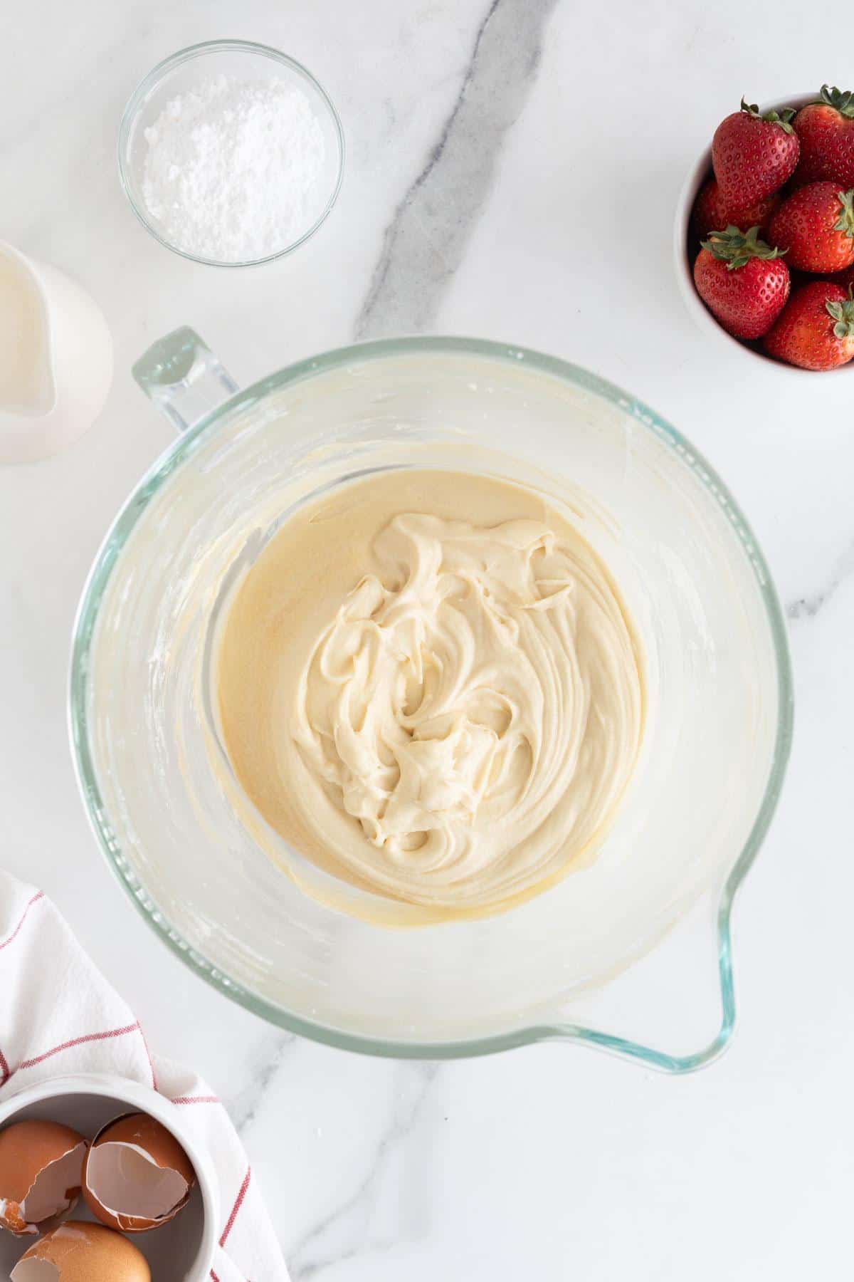 A fully mixed batter in the glass bowl, ready for baking