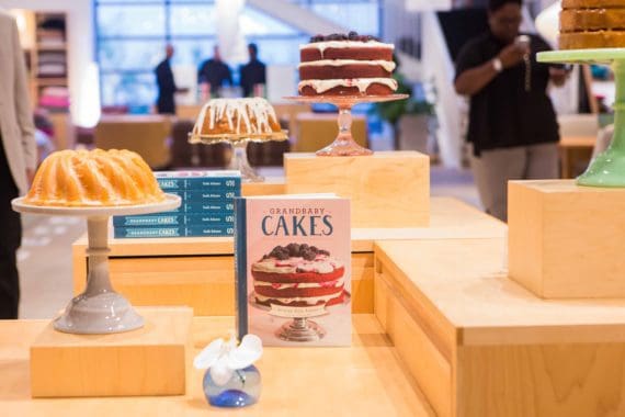 Grandbaby Cakes Launch Party venue with copies of the book and cakes on display