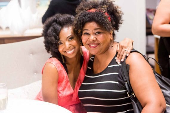 Jocelyn Delk Adams posing with pastry chef at launch party