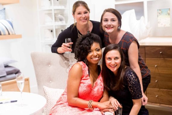 Jocelyn Delk Adams posing with three launch party attendees