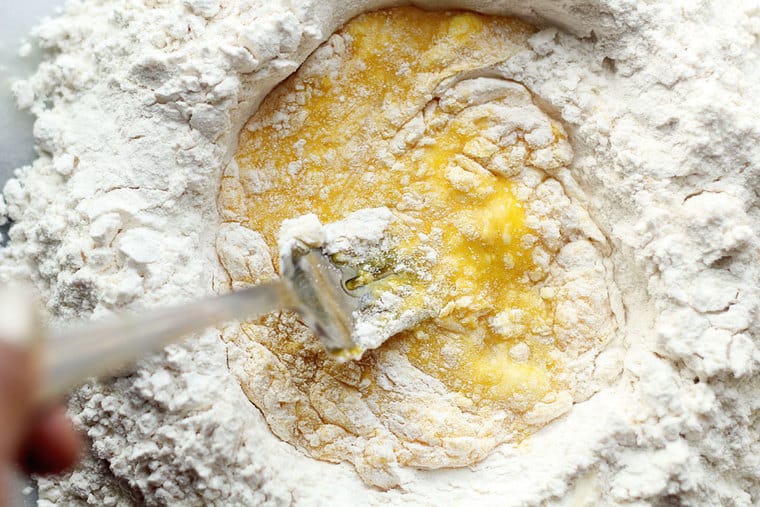 Making Homemade Pasta recipe Base of eggs and flour for Butternut Squash Ravioli Recipe