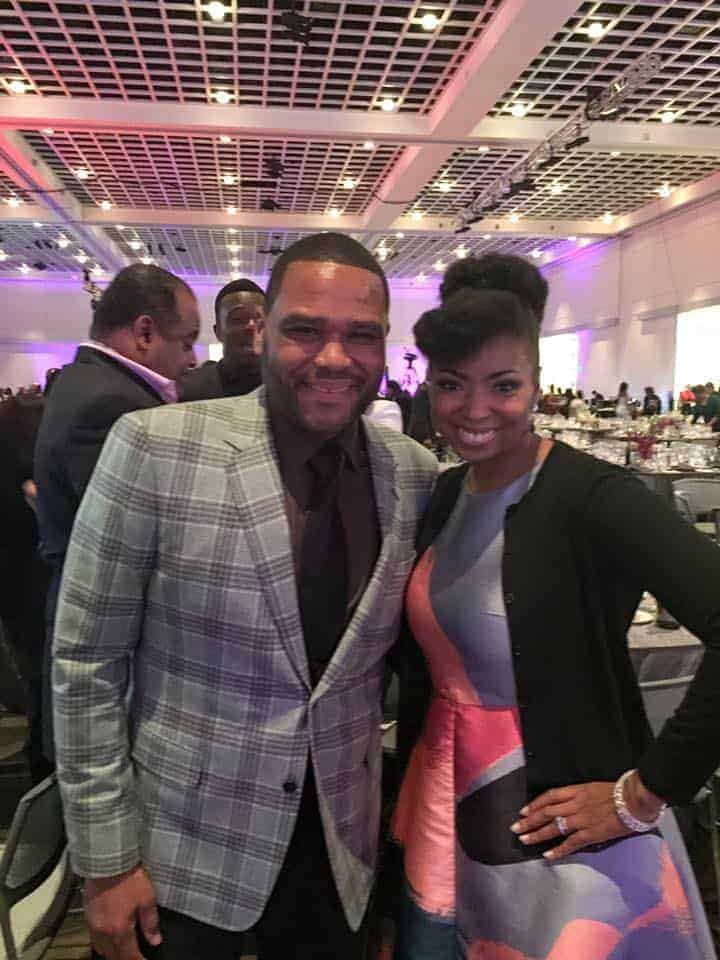 Jocelyn Delk Adams poses for a photo with actor Anthony Anderson