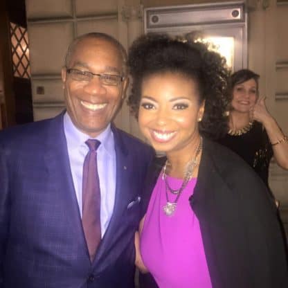 Jocelyn Delk Adams posing for a photo with actor Joe Morton 