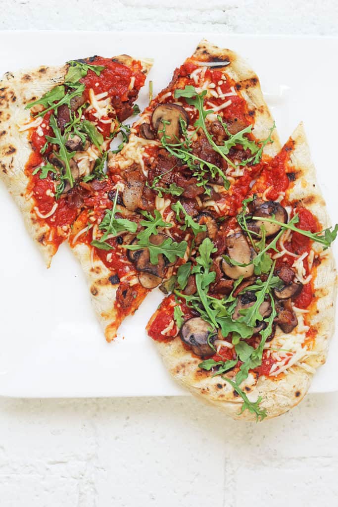 Homemade Flatbread Pizza Dough used to make a delicious pizza topped with mushrooms and cheese