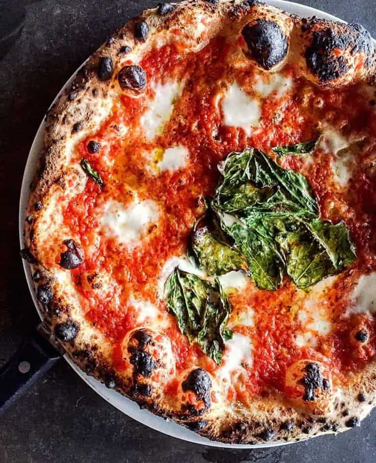 Overhead shot of a margherita pizza from one of the best restaurants in Los Angeles