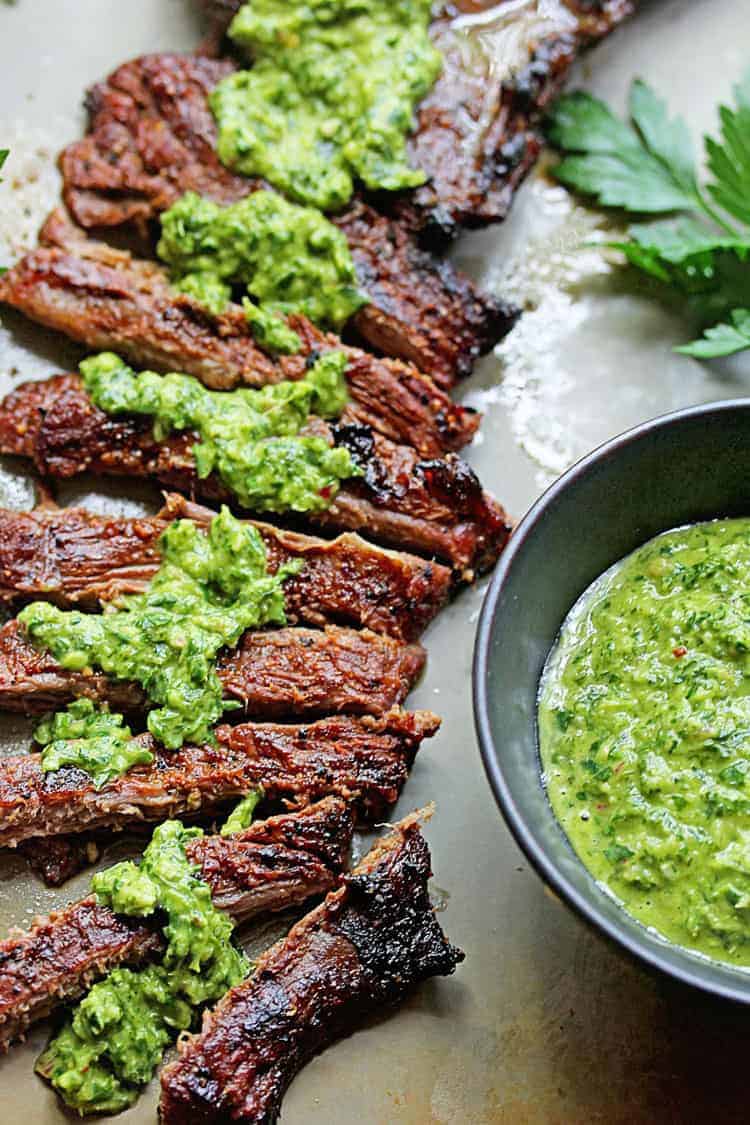 https://grandbaby-cakes.com/wp-content/uploads/2016/07/Marinated-Skirt-Steak-with-Chimichurri-3.jpg