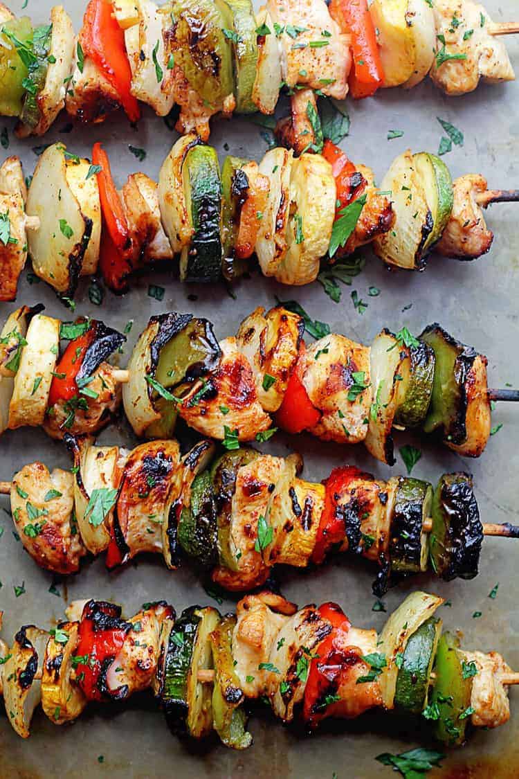 Grilled Chicken Kabobs topped with an apricot glaze.