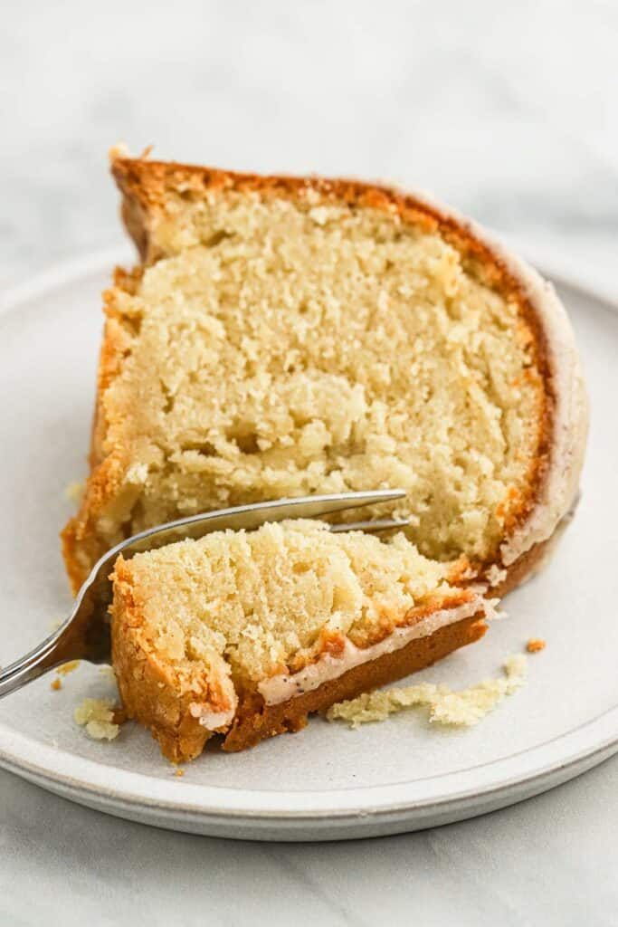 Brown Sugar Pound Cake with Brown Butter Glaze on a circular, white plate