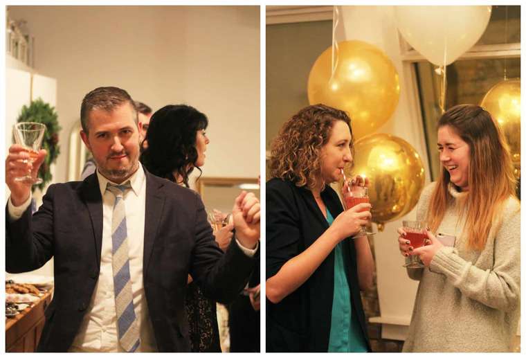 Holiday party attendees drinking the bubbly cocktail