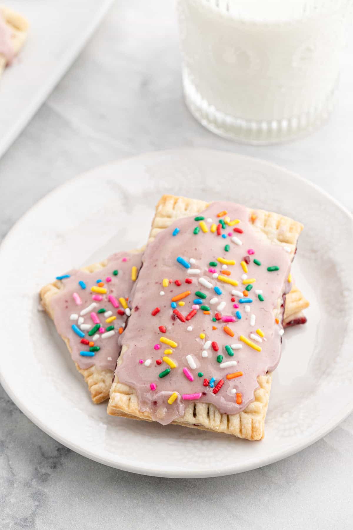 Close up of delicious pop tarts with sprinkles with jam inside