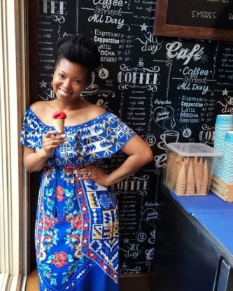 Jocelyn Delk Adams holding an ice cream cone with sorbet