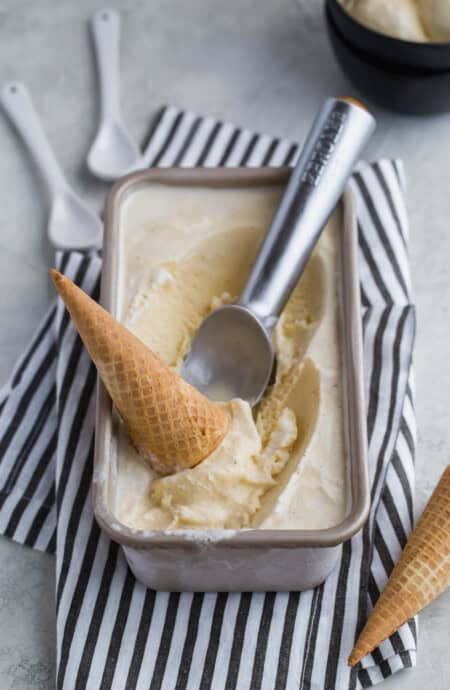 Homemade Vanilla Ice Cream Recipe - Learn how to make vanilla ice cream!  This old fashioned family recipe is made from a sweet creamy custard with pure vanilla flavor featuring vanilla bean!