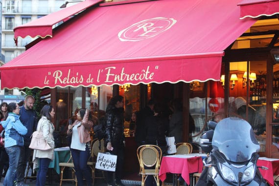 Restaurant patrons lined up to enter Le Relais de L'entrecote 