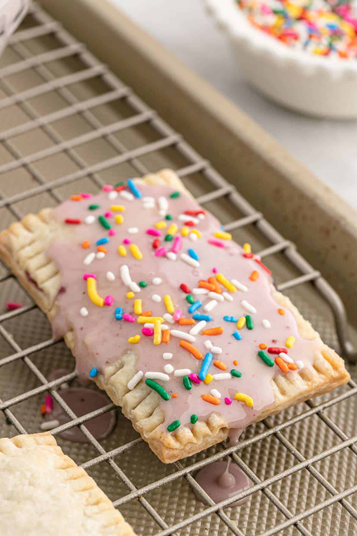 Finished pop tart on a wire rack.