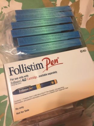Several packs of follistim pens 