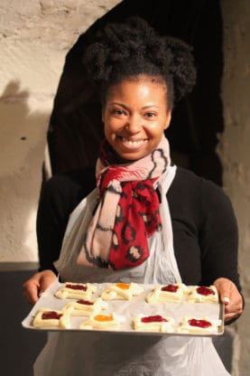 Jocelyn holding a tray of dessert croissants before baking at La Cuisine Paris