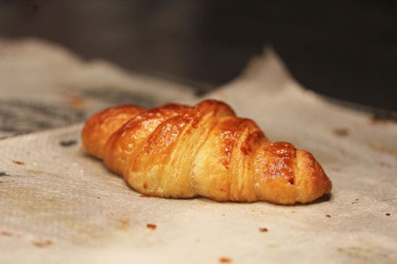 A finished chocolate filled croissant from baking class at La Cuisine Paris