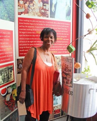 Jocelyn's mother poses for a photo at the Southern Food and Beverage Museum