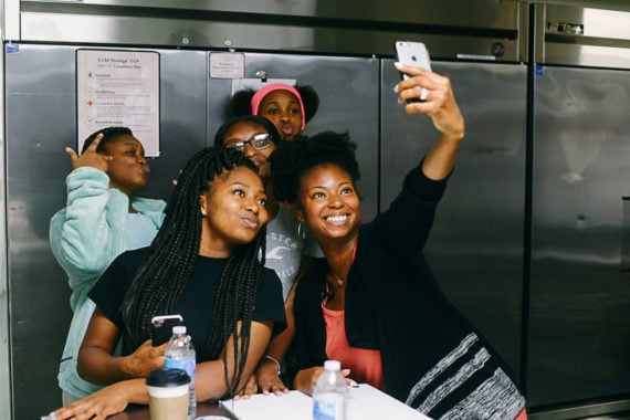 Jocelyn taking a selfie with her baking students for the State Farm Neighborhood of Good 