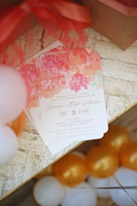 A shot of a set of baby show invitations