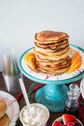 Orange Ginger Pancakes on a blue cake stand ready to serve for the holidays