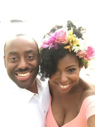 Jocelyn Delk Adams and her husband on the beach in Maui