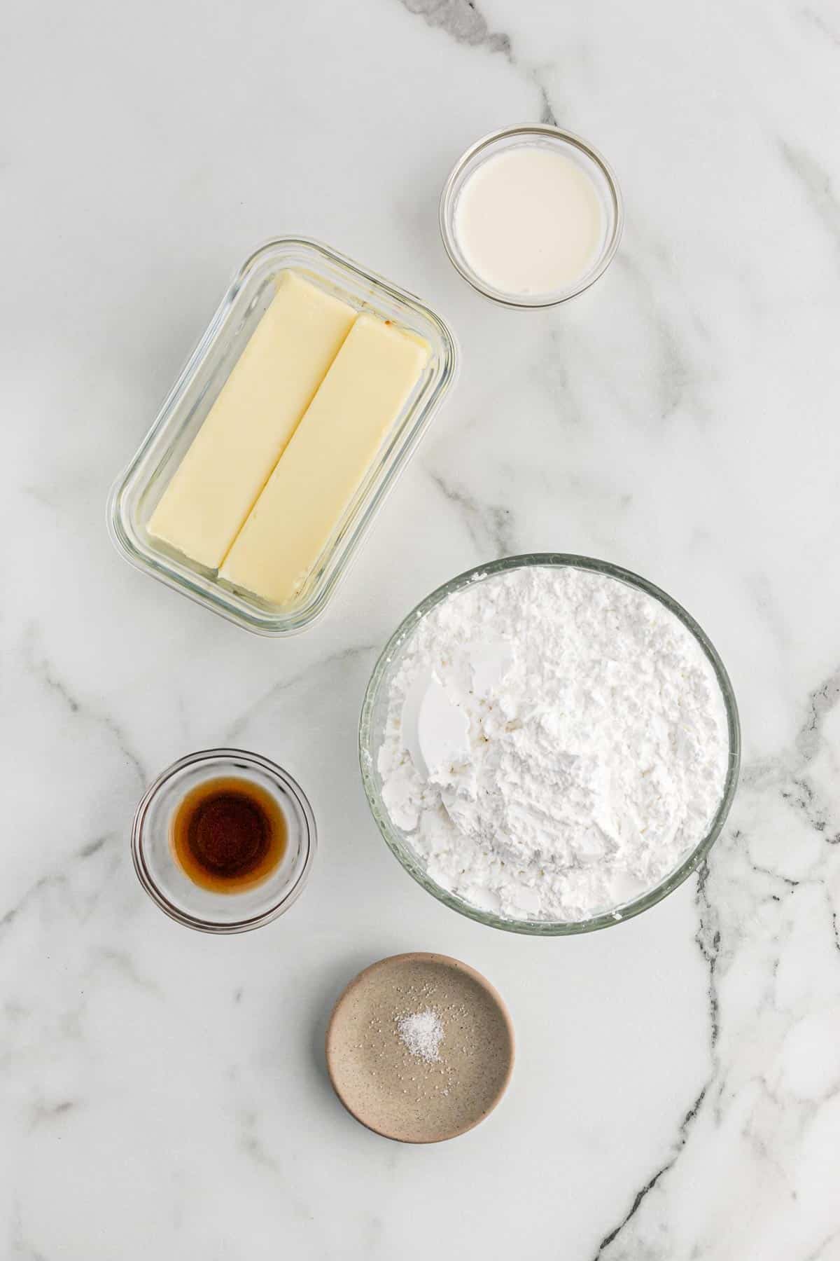 Ingredients to make American buttercream frosting on the table.