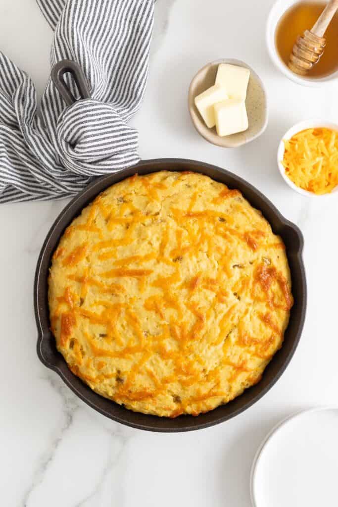 Baked Mexican cornbread in a cast iron skillet