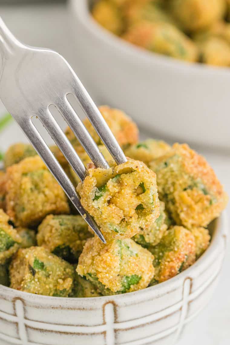 A fork piercing through Southern fried okra recipe before enjoy