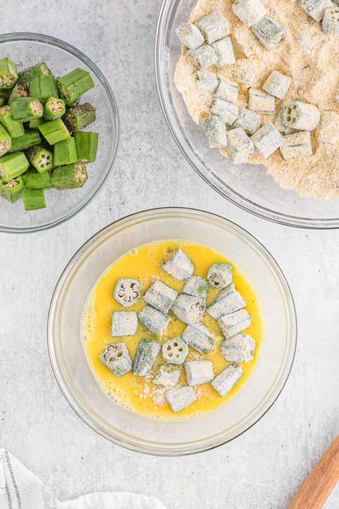 Breaded okra in an egg bath